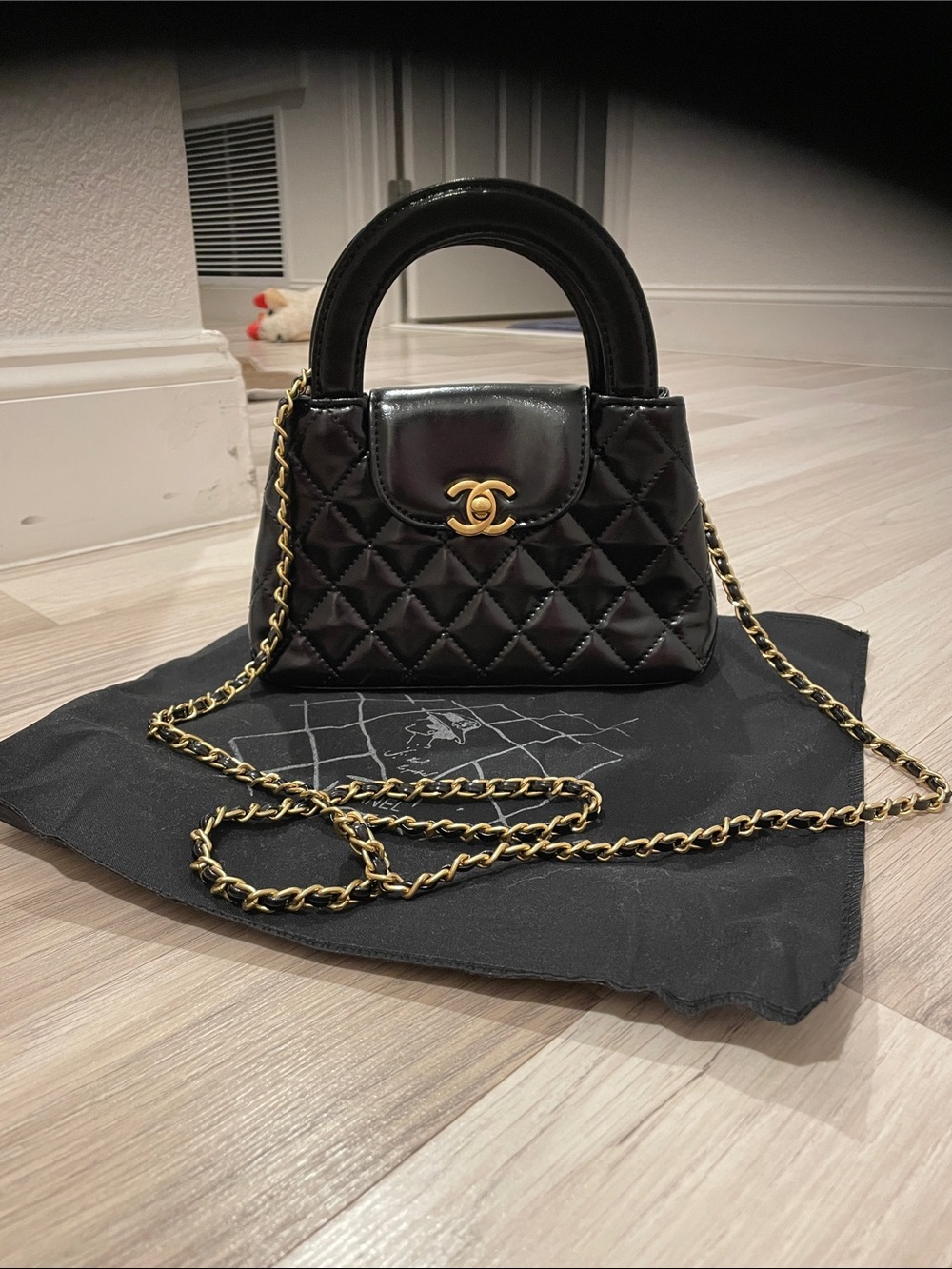 CHANEL Black Quilted Mini Top-Handle Bag with Gold Chain